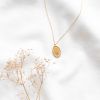Collier médaillon gravé lettre M