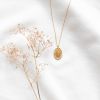 Collier médaillon gravé lettre T