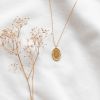 Collier médaillon gravé lettre X