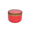 Boite ronde rose en verre et laiton