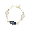 Bracelet doré et main de fatma