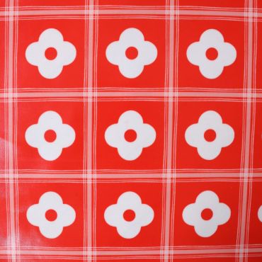 toile cirée rouge à fleurs blanches